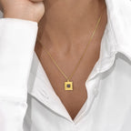 Keepsake pendant close-up showing the Nano Qur’an chip
